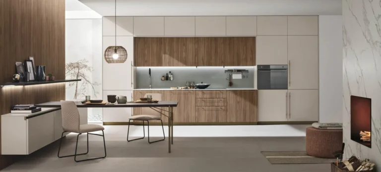 Cucina lineare con penisola Stosa Metropolis 04 in termo strutturato Noce Eucalipto, Pet opaco Cachemere, top Neolith Calacatta Silk, tavolo Fenix Cacao Orinoco