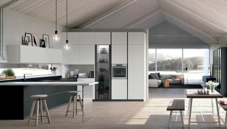 Cucina ad angolo con penisola Stosa Metropolis 17 in pet opaco Bianco Assoluto e Nero, top Fenix Nero Ingo